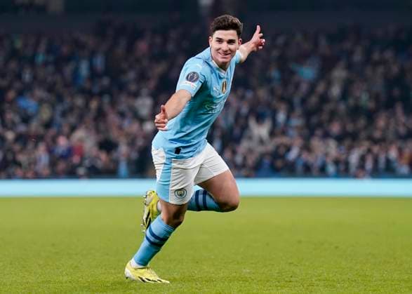 MANCHESTER, ENGLAND, 6th March 2024. Julian Ãlvarez of Manchester City celebrates after scoring to make it 2-0 during the UEFA Champions League match at the Etihad Stadium, MANCHESTER. Picture credit should read: Andrew Yates Sportimage EDITORIAL USE ONLY. No use with unauthorised audio, video, data, fixture lists, club league logos or live services. Online in-match use limited to 120 images, no video emulation. No use in betting, games or single club league player publications. SPI-2988-0034