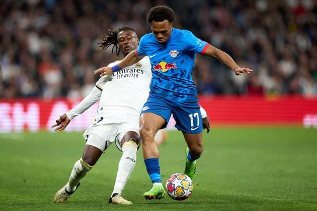 Lois Openda of RB Leipzig (R) in action with Eduardo Camavinga of Real Madrid CF (L) during the UEFA Champions League match between Real Madrid v RB Leipzig at Santiago Bernabeu on March 6, 2024 in Madrid (Photo by: LGM) FOOTBALL : Real Madrid vs RB Leipzig - UEFA Ligue des Champions - 06 03 2024 LGM Panoramic 