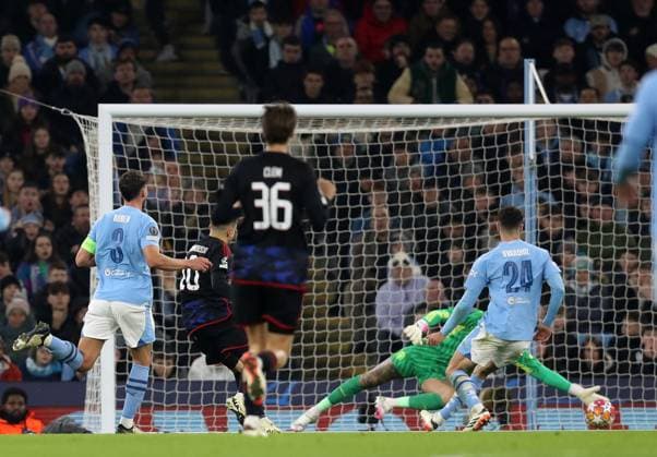 6th March 2024; Etihad Stadium, Manchester, England; Champions League Football, Round of 16, Manchester City versus Copenhagen; Mohamed Elyounoussi of FC Copenhagen beats Manchester City goalkeeper Ederson to score for 2-1 after 29 minutes  ActionPlus12615737 DavidxBlunsden