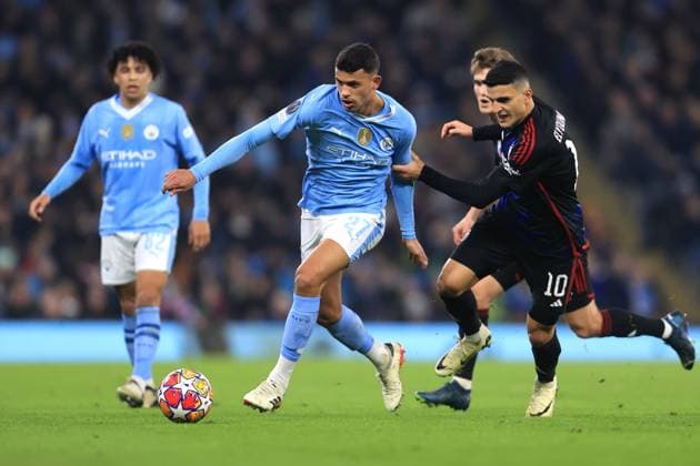 UEFA Champions League - Manchester City v FC Copenhagen 06 March 2024 - UEFA Champions League - Round of 16 (2nd Leg) - Manchester City v FC Copenhagen - Matheus Nunes of Manchester City and Mohamed Elyounoussi of FC Copenhagen - Photo: Simon Stacpoole Offside. Manchester UK Copyright: xSimonxStacpoolexOffside