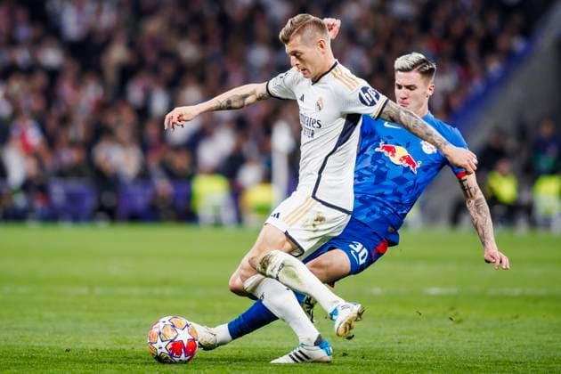 March 6, 2024, Madrid, Spain: Toni Kroos of Real Madrid CF battles for the ball with Benjamin Sesko of RB Leipzig during the Champions League match between Real Madrid and RB Leipzig at Santiago Bernabeu Stadium on March 6, 2024 in Madrid, Spain. Madrid Spain - ZUMAd159 20240306_zia_d159_011 Copyright: xMaxDexGraciaxJimenezx