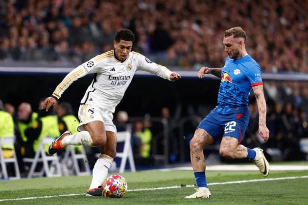 March 6, 2024, Madrid, Madrid, SPAIN: Jude Bellingham of Real Madrid and David Raum of RB Leipzig in action during the UEFA CHampions League, Round of 16, football match played between Real Madrid and RB Leipzig at Santiago Bernabeu stadium on March 06, 2024, in Madrid, Spain. Madrid SPAIN - ZUMAa181 20240306_zaa_a181_048 Copyright: xOscarxJ.xBarrosox