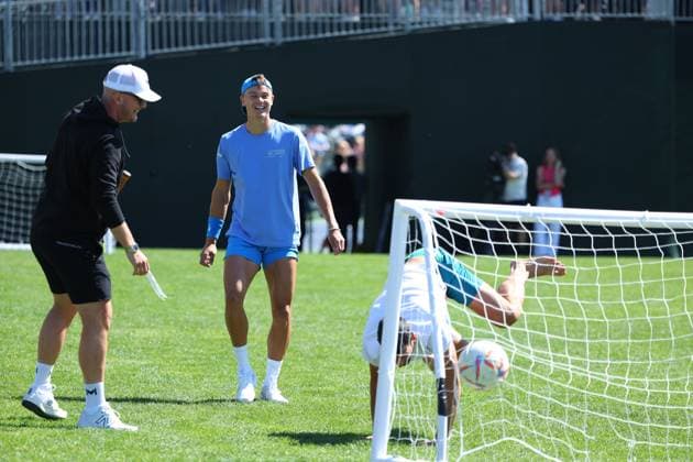 Holger Rune playing soccer with Novak Djokovic (Ser) TENNIS : Indian Wells 2024 - 06 03 2024 AntoineCouvercelle Panoramic 