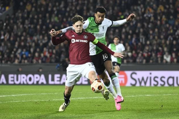 From left Ladislav Krejci of Sparta, Cody Gakpo of Liverpool in action during the Europa League semifinal opening match: Sparta vs Liverpool in Prague, Czech Republic, March 7, 2024. (CTKxPhoto OndrejxDeml) CTKPhotoP2024030708586  CTKPhotoP2024030708586