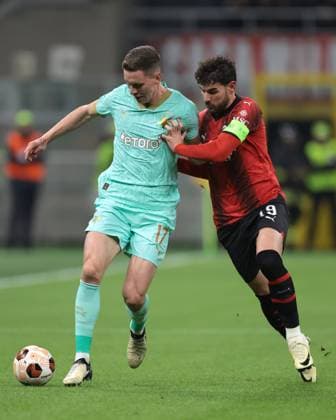 Milan, Italy, 7th March 2024. Theo Hernandez of AC Milan tussles with Lukas Provod of Slavic Praha the UEFA Europa League match at Giuseppe Meazza, Milan. Picture credit should read: Jonathan Moscrop Sportimage EDITORIAL USE ONLY. No use with unauthorised audio, video, data, fixture lists, club league logos or live services. Online in-match use limited to 120 images, no video emulation. No use in betting, games or single club league player publications. SPI-2971-0009