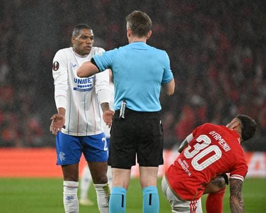 Referee Tobias Stieler cautions Dujon Sterling of Rangers Benfica v Rangers, UEFA Europa League, Round of 16, First Leg, Football, Estadio da Luz, Lisbon, Portugal - 07 Mar 2024 EDITORIAL USE ONLY No use with unauthorised audio, video, data, fixture lists, club league logos or live services. Online in-match use limited to 120 images, no video emulation. No use in betting, games or single club league player publications. Copyright: xZedxJameson Shutterstockx 14373669as