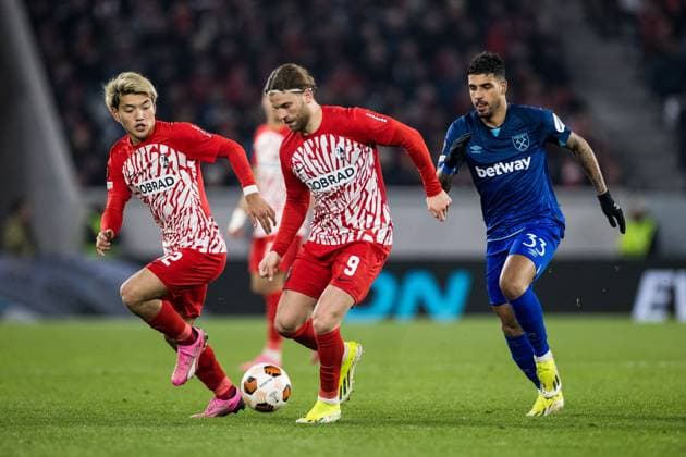 UEFA Europa League: SC Freiburg - West Ham United; 07.03.2024 Zweikampf Ritsu Doan (SC Freiburg, 42), Lucas Höler (SC Freiburg, 9), Emerson (West Ham United, 33) UEFA Europa League: SC Freiburg - West Ham United, Freiburg, Europa Park Stadion am 07.03.2024 Copyright: xBEAUTIFULxSPORTS Wunderlx