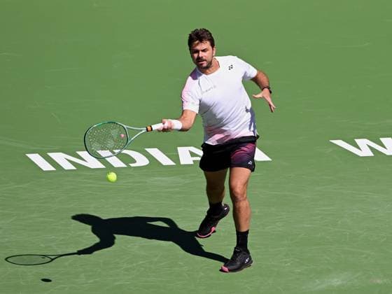 INDIAN WELLS, CA - MARCH 07: Stan Wawrinka (SUI) returns the ball during an ATP, Tennis Herren tennis match played on March 7, 2024 at the BNP Paribas Open at the Indian Wells Tennis Garden in Indian Wells, CA. (Photo by John Cordes Icon Sportswire) TENNIS: MAR 07 BNP Paribas Open EDITORIAL USE ONLY Icon506240307001