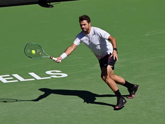 INDIAN WELLS, CA - MARCH 07: Stan Wawrinka (SUI) returns the ball during an ATP, Tennis Herren tennis match played on March 7, 2024 at the BNP Paribas Open at the Indian Wells Tennis Garden in Indian Wells, CA. (Photo by John Cordes Icon Sportswire) TENNIS: MAR 07 BNP Paribas Open EDITORIAL USE ONLY Icon506240307008