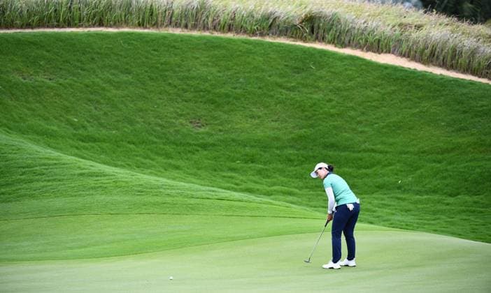 (240308) -- LINGSHUI, March 8, 2024 -- Lin Xiyu of China putts a shot during the second round of the Blue Bay LPGA, Golf Damen golf tournament in Lingshui, south China s Hainan Province, March 8, 2024. ) (SP)CHINA-HAINAN-LINGSHUI-GOLF-BLUE BAY LPGA (CN) YangxGuanyu 