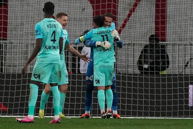 Teji Savanier (Montpellier HSC) - Benjamin Lecomte (Montpellier HSC) FOOTBALL : OGC Nice vs Montpellier - Ligue 1 Uber Eats - Nice - 08 03 2024 NorbertScanella Panoramic 