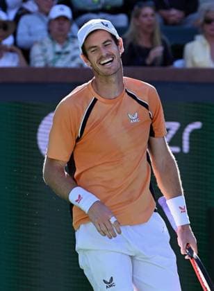 INDIAN WELLS, CA - MARCH 08: Andy Murray (GBR) reacts with a smile after losing a point during a ATP, Tennis Herren tennis match played on March 8, 2024 during the BNP Paribas Open played at the Indian Wells Tennis Garden in Indian Wells, CA. (Photo by John Cordes Icon Sportswire) TENNIS: MAR 08 BNP Paribas Open EDITORIAL USE ONLY Icon506240308073