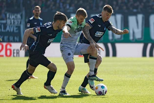 09.03.2024, xavx, Fussball 2.Bundesliga, SV Wehen Wiesbaden - Hannover 96 emspor, v.l. Gino Fechner (SV Wehen Wiesbaden), NicolÃ² Tresoldi (Hannover 96), Marcus Mathisen (SV Wehen Wiesbaden) (DFL DFB REGULATIONS PROHIBIT ANY USE OF PHOTOGRAPHS as IMAGE SEQUENCES and or QUASI-VIDEO) Wiesbaden