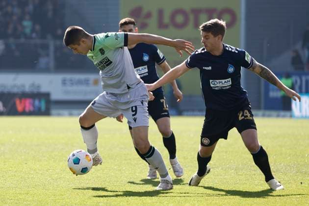 09.03.2024, xavx, Fussball 2.Bundesliga, SV Wehen Wiesbaden - Hannover 96 emspor, v.l. NicolÃ² Tresoldi (Hannover 96), Marcus Mathisen (SV Wehen Wiesbaden) (DFL DFB REGULATIONS PROHIBIT ANY USE OF PHOTOGRAPHS as IMAGE SEQUENCES and or QUASI-VIDEO) Wiesbaden