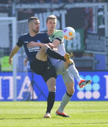 09.03.2024, xblx, Fussball 2.Bundesliga, SV Wehen Wiesbaden - Hannover 96 emspor, v.l. Ivan Prtajin (SV Wehen Wiesbaden), Fabian Kunze (Hannover 96) (DFL DFB REGULATIONS PROHIBIT ANY USE OF PHOTOGRAPHS as IMAGE SEQUENCES and or QUASI-VIDEO) Wiesbaden