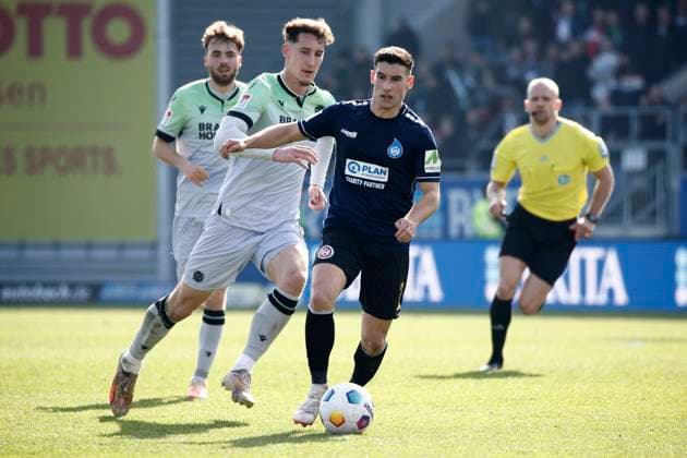 09.03.2024, xavx, Fussball 2.Bundesliga, SV Wehen Wiesbaden - Hannover 96 emspor, v.l. Phil Neumann (Hannover 96), Robin Heußer (SV Wehen Wiesbaden) (DFL DFB REGULATIONS PROHIBIT ANY USE OF PHOTOGRAPHS as IMAGE SEQUENCES and or QUASI-VIDEO) Wiesbaden