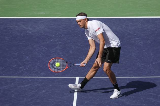 INDIAN WELLS, CA - MARCH 09: Taylor Fritz (USA) hits a volley during the BNP Paribas Open on March 9, 2024 at Indian Wells Tennis Garden in Indian Wells, CA. (Photo by George Walker Icon Sportswire) TENNIS: MAR 09 BNP Paribas Open EDITORIAL USE ONLY Icon240309039