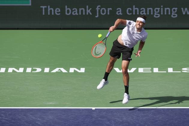 INDIAN WELLS, CA - MARCH 09: Taylor Fritz (USA) serves during the BNP Paribas Open on March 9, 2024 at Indian Wells Tennis Garden in Indian Wells, CA. (Photo by George Walker Icon Sportswire) TENNIS: MAR 09 BNP Paribas Open EDITORIAL USE ONLY Icon240309042