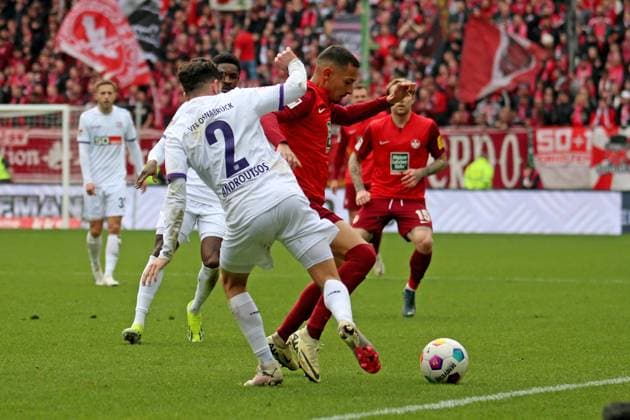 10.03.2024, xmohx, Fussball 2.Bundesliga, 1.FC Kaiserslautern - VfL Osnabrück emspor, v.l. Athanasios Androutsos (VfL Osnabrueck Osnabrück) Kenny Prince Redondo (1. FC Kaiserslautern) Zweikampf, Aktion, action, battle for the ball (DFL DFB REGULATIONS PROHIBIT ANY USE OF PHOTOGRAPHS as IMAGE SEQUENCES and or QUASI-VIDEO) Kaiserslautern