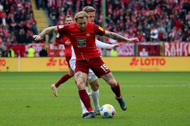 10.03.2024, xmohx, Fussball 2.Bundesliga, 1.FC Kaiserslautern - VfL Osnabrück emspor, v.l. Tymoteusz Puchacz (1. FC Kaiserslautern) Jannes Wulf (VfL Osnabrueck Osnabrück) Zweikampf, Aktion, action, battle for the ball (DFL DFB REGULATIONS PROHIBIT ANY USE OF PHOTOGRAPHS as IMAGE SEQUENCES and or QUASI-VIDEO) Kaiserslautern