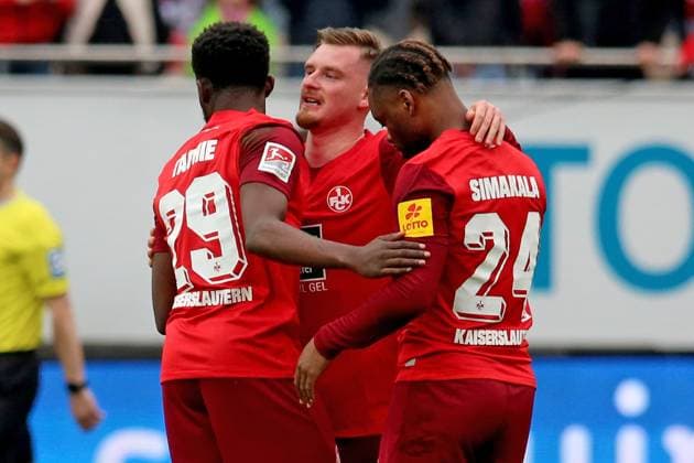10.03.2024, xmohx, Fussball 2.Bundesliga, 1.FC Kaiserslautern - VfL Osnabrück emspor, v.l. Jubel Freude über ueber den Sieg bei Richmond Tachie (1. FC Kaiserslautern) Ba-Muaka Simakala (1. FC Kaiserslautern) Marlon Ritter (1. FC Kaiserslautern) (DFL DFB REGULATIONS PROHIBIT ANY USE OF PHOTOGRAPHS as IMAGE SEQUENCES and or QUASI-VIDEO) Kaiserslautern