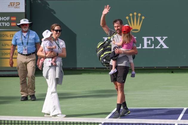 INDIAN WELLS, CA - MARCH 10: Steve Johnson (USA) and his family exit the court after his final professional match during the BNP Paribas Open on March 10, 2024 at Indian Wells Tennis Garden in Indian Wells, CA. (Photo by George Walker Icon Sportswire) TENNIS: MAR 10 BNP Paribas Open EDITORIAL USE ONLY Icon240310111