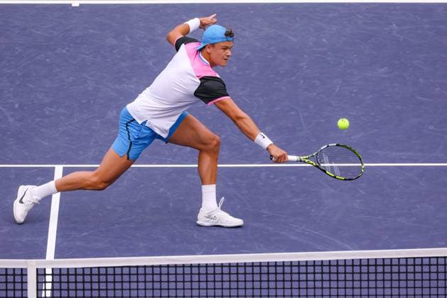 INDIAN WELLS, CA - MARCH 11: Holger Rune (DEN) hits a volley during the BNP Paribas Open on March 11, 2024 at Indian Wells Tennis Garden in Indian Wells, CA. (Photo by George Walker Icon Sportswire) TENNIS: MAR 11 BNP Paribas Open EDITORIAL USE ONLY Icon240311005