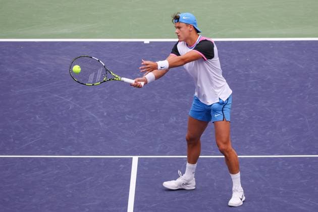 INDIAN WELLS, CA - MARCH 11: Holger Rune (DEN) hits a volley during the BNP Paribas Open on March 11, 2024 at Indian Wells Tennis Garden in Indian Wells, CA. (Photo by George Walker Icon Sportswire) TENNIS: MAR 11 BNP Paribas Open EDITORIAL USE ONLY Icon240311008