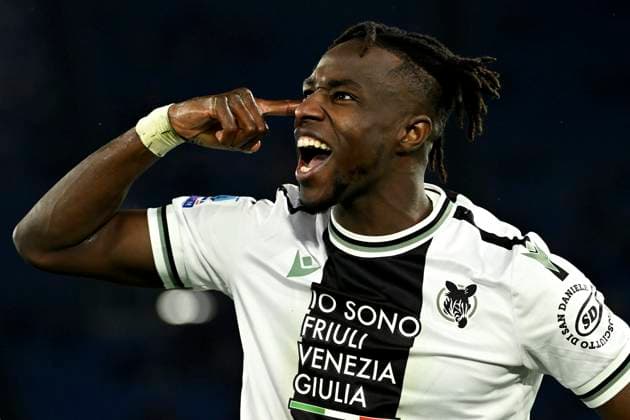 Sport Themen der Woche KW11 Sport Bilder des Tages Hassane Kamara of Udinese Calcio celebrates after Lorenzo Lucca (not pictured) scored the goal of 0-1 during the Serie A football match between SS Lazio and Udinese Calcio at Olimpico stadium in Rome (Italy), March 11, 2024. AntoniettaxBaldassarre