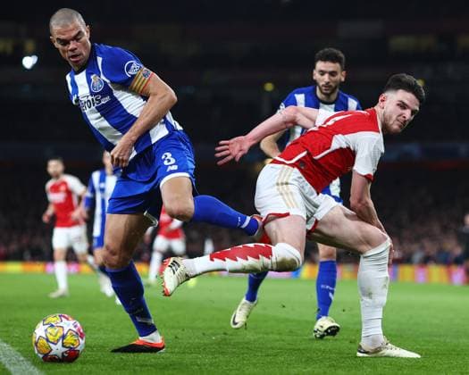 Sport Bilder des Tages Arsenal v Porto 12 March 2024, London - UEFA Champion™s League, Round of Sixteen, Second Leg - Arsenal v Porto - Pepe of Porto and Declan Rice of Arsenal - Photo: Charlotte Wilson Offside. London UK Copyright: xCharlottexWilsonx xOffsidexOffside