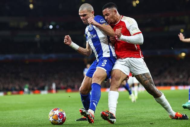 Arsenal v Porto 12 March 2024, London - UEFA Champion™s League, Round of Sixteen, Second Leg - Arsenal v Porto - Gabriel Jesus of Arsenal shoves into the back of Pepe of Porto - Photo: Charlotte Wilson Offside. London UK Copyright: xCharlottexWilsonx xOffsidexOffside