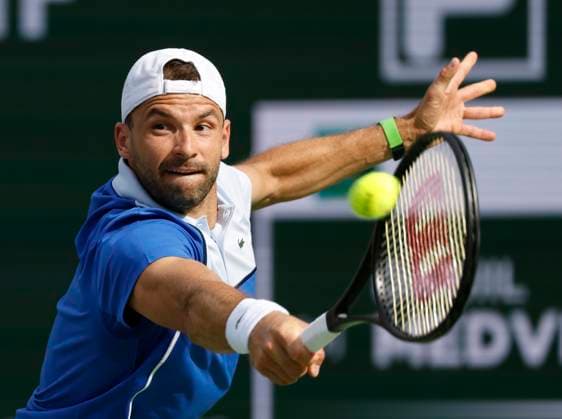 Tennis 2024: BNP Paribas Open MAR 13 March 13, 2024 Grigor Dimitrov of Bulgaria returns a shot against Daniil Medvedev of Russia during the BNP Paribas Open in Indian Wells, CA. Charles Baus CSM (Credit Image: Â Charles Baus Cal Media) Indian Wells Ca United States of America EDITORIAL USE ONLY Copyright: xx ZUMA-20240313_zma_c04_172.jpg CharlesxBausx csmphotothree241846