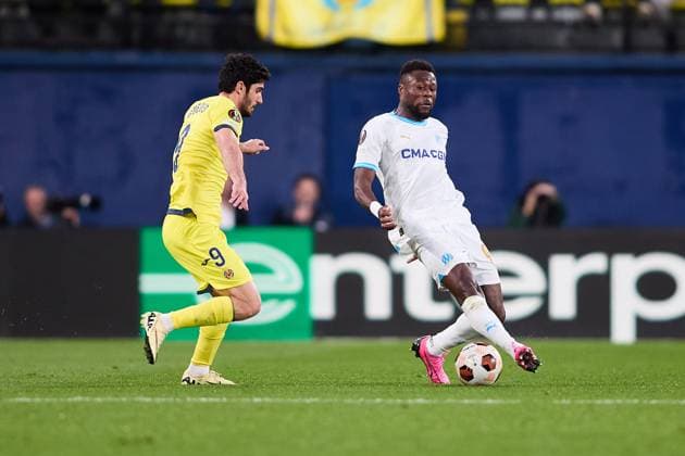 Chancel Mbemba of Olympique Marseille runs with the ball during the UEFA Europa League 2023 24 round of 16 second leg match between Villarreal CF and Olympique Marseille at Estadio de la Ceramica on March 14, 2024 in Villarreal, Spain. FOOTBALL : Villarreal vs Olympique de Marseille - UEFA Ligue Europa - 1 8 Huitiemes - 14 03 2024 LGM Panoramic 