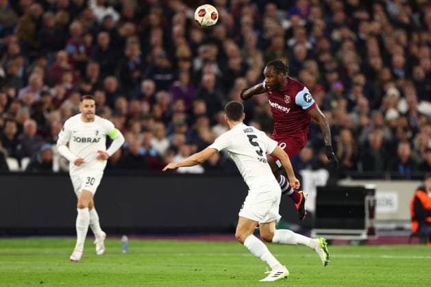 Lucas Paqueta of West Ham United under pressure from Manuel Gulde of SC Freiburg West Ham United v Freiburg, UEFA Europa League, Round of 16, Second Leg, Football, London Stadium, London, UK - 14 Mar 2024 EDITORIAL USE ONLY No use with unauthorised audio, video, data, fixture lists, club league logos or live services. Online in-match use limited to 120 images, no video emulation. No use in betting, games or single club league player publications. Copyright: xSimonxDael Shutterstockx 14385551x