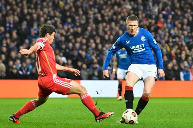 Rangers v Benfica UEFA Europa League John Lundstram of Rangers and Joao Neves of Benfica during the UEFA Europa League Round of 16 Second Leg match at Ibrox Stadium, Glasgow Copyright: xJamiexJohnstonx FIL-19833-0032 UK Newspapers OUT