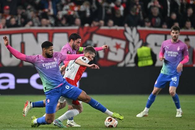 (L-R) Ruben Loftus-Chee and Davide Calabria of AC Milan, David Doudera of Slavia Praha and Matteo Gabbial of AC Milan in action during the Slavia Praha vs AC Milan football return match of the Europa League semi-final on March 14, 2024, Prague, Czech Republic. (CTKxPhoto MichalxKamaryt) CTKPhotoP2024031407759  CTKPhotoP2024031407759