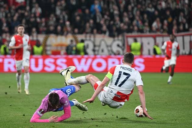 Matteo Gabbia of AC Milan, left, and Lukas Provod of Slavia Praha in action during the Slavia Praha vs AC Milan football return match of the Europa League semi-final on March 14, 2024, Prague, Czech Republic. (CTKxPhoto MichalxKamaryt) CTKPhotoP2024031408001  CTKPhotoP2024031408001