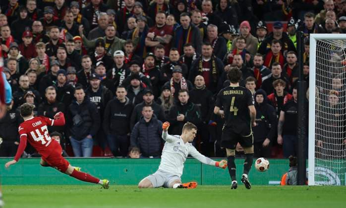 Liverpool FC v AC Sparta Praha: Round of 16 Second Leg - UEFA Europa League 2023 24 Bobby Clark of Liverpool scores 2nd goal past Peter Vindahl, Goalkeeper of Sparta Prague during the UEFA Europa League 2023 24 round of 16 second leg match between Liverpool FC and AC Sparta Praha at Anfield on March 14, 2024 in Liverpool, England. Liverpool Anfield England United Kingdom Copyright: xSportsphoto Sportsphoto APLx 13969498
