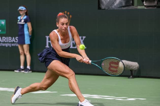INDIAN WELLS, CA - MARCH 14: Marta Kostyuk (UKR) hits a backhand during the BNP Paribas Open on March 14, 2024 at Indian Wells Tennis Garden in Indian Wells, CA. (Photo by George Walker Icon Sportswire) TENNIS: MAR 14 BNP Paribas Open EDITORIAL USE ONLY Icon240314018