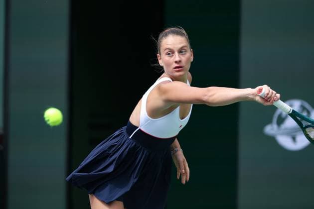 INDIAN WELLS, CA - MARCH 14: Marta Kostyuk (UKR) hits a backhand during the BNP Paribas Open on March 14, 2024 at Indian Wells Tennis Garden in Indian Wells, CA. (Photo by George Walker Icon Sportswire) TENNIS: MAR 14 BNP Paribas Open EDITORIAL USE ONLY Icon240314020