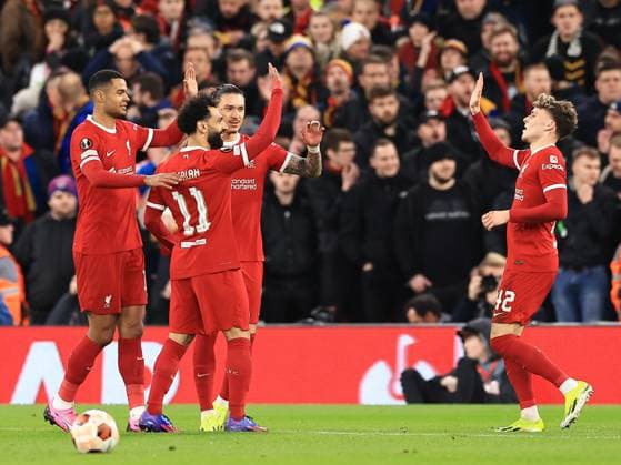 Liverpool FC v AC Sparta Prague Mohamed Salah of Liverpool (11) scores his sides third goal of the match and celebrates with team mates during the Liverpool FC v AC Sparta Prague Last 16, 2nd Leg UEFA Europa League match at Anfield, Liverpool, England, United Kingdom on 14 March 2024 Editorial use only. All images are copyright Every Second Media Limited. No images may be reproduced without prior permission. Copyright: xIMAGO EveryxSecondxMediax ESM-0951-0039