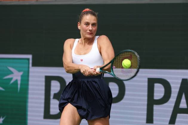 INDIAN WELLS, CA - MARCH 14: Marta Kostyuk (UKR) hits a backhand during the BNP Paribas Open on March 14, 2024 at Indian Wells Tennis Garden in Indian Wells, CA. (Photo by George Walker Icon Sportswire) TENNIS: MAR 14 BNP Paribas Open EDITORIAL USE ONLY Icon240314031