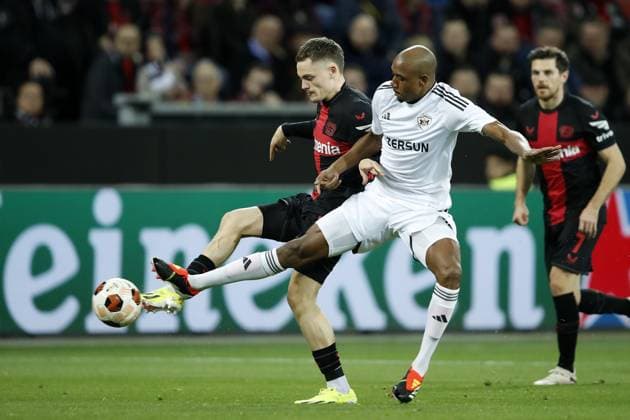 LEVERKUSEN - (l-r) Florian Wirtz of Bayer 04 Leverkusen, Julio Romao of FK Qarabag during the UEFA Europa league round of 16 match between Bayer 04 Leverkusen and FK Qarabag at De Bay Arena on March 14, 2024 in Leverkusen, Germany. ANP Hollandse Hoogte Bart Stoutjesdijk UEFA Europa League 2023 24 2023 2024 xVIxANPxSportx xBartxStoutjesdijkxIVx 493697864 originalFilename: 493697864.jpg