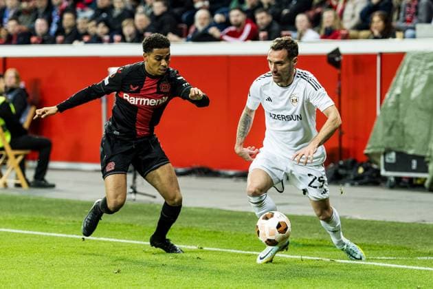 UEFA Europa League: Bayer 04 Leverkusen - Qarabag Agdam; 14.03.2024 Zweikampf Amine Adli (Bayer 04 Leverkusen, 21), Marko Vesovic (Qarabag Agdam, 29) UEFA Europa League: Bayer 04 Leverkusen - Qarabag Agdam, BayArena Leverkusen am 14.03.2024 Copyright: xBEAUTIFULxSPORTS Wunderlx