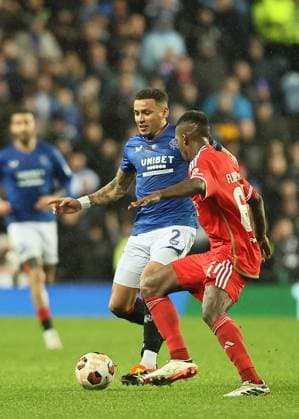 Rangers v Benfica UEFA Europa League James Tavernier of Rangers (left) cuts inside Florentino Luis of Benfica during the UEFA Europa League Round of 16 Second Leg match at Ibrox Stadium, Glasgow Copyright: xFredxPalmerx FIL-19834-0079 UK Newspapers OUT