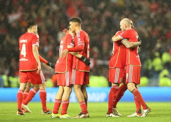 Rangers v Benfica UEFA Europa League Benfica players celebrate at full time during the UEFA Europa League Round of 16 Second Leg match at Ibrox Stadium, Glasgow Copyright: xFredxPalmerx FIL-19834-0084 UK Newspapers OUT