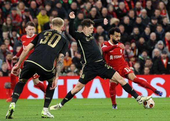 14th March 2024; Anfield, Liverpool, Merseyside, England; Europa League, Round of 16, Second Leg Football, Liverpool versus Sparta Prague; Mohammed Salah of Liverpool is tackled by Ladislav Krejci of Sparta Prague  ActionPlus12617999 DavidxBlunsden