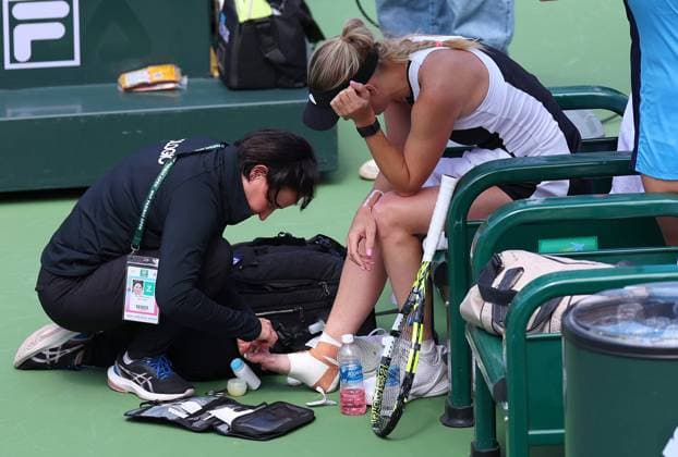 Caroline Wozniacki of Denmark receives medical treatment on her foot BNP Paribas Open, Tennis, Day 9, Indian Wells Tennis Garden, California, USA - 14 Mar 2024  Copyright: xEllaxLing Shutterstockx 14386185ar