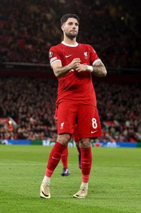 Dominik Szoboszlai of Liverpool scores the 5th goal and celebrates Liverpool v Sparta Prague, UEFA Europa League, Round of 16, Second Leg, Football, Anfield, Liverpool, UK - 14 Mar 2024 EDITORIAL USE ONLY No use with unauthorised audio, video, data, fixture lists, club league logos or live services. Online in-match use limited to 120 images, no video emulation. No use in betting, games or single club league player publications. Copyright: xPaulxCurrie Shutterstockx 14385501av