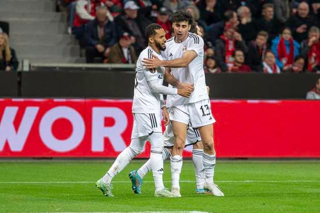 Bahlul Mustafazada (Qarabag Agdam, 13) umarmt den Troschuetzen zum 2:0 Juninho (Qarabag Agdam, 18). Fussball: UEFA Europa League, Saison 2023 2024, Achtelfinale, Rueckspiel, Bayer 04 Leverkusen - Qarabag FK am 14.03.2024 in der BayArena in Leverkusen. Foto: Kirchner-Media TH Copyright: xKirchner-Media THx